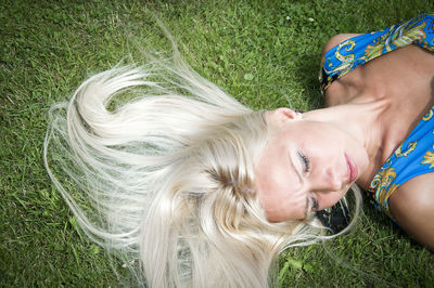 High angle view of man lying on hand