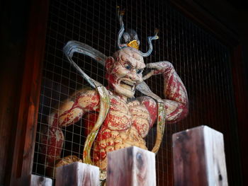 Low angle view of buddha statue