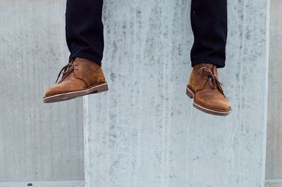 Low section of man standing on floor