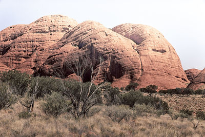 Rock formation on land against sky