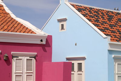 Low angle view of houses against sky