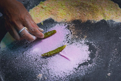 High angle view of person preparing food