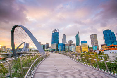 Modern buildings in city against sky