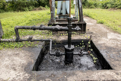 Close-up of metallic structure on field