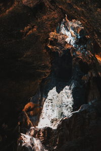 Close-up of rock formation in water