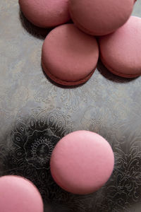 High angle view of pink eggs on table