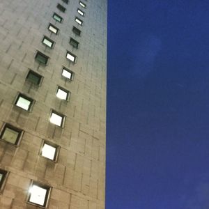 Low angle view of modern building against sky