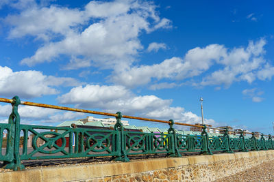 Low angle view of bridge against blue sky