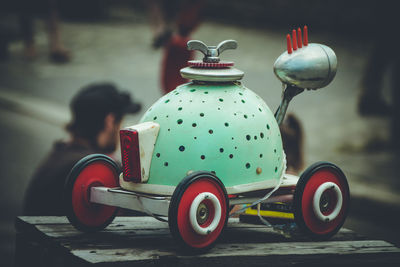 Close-up of toy car on wood