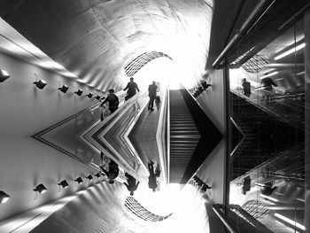 Low section of people walking in corridor