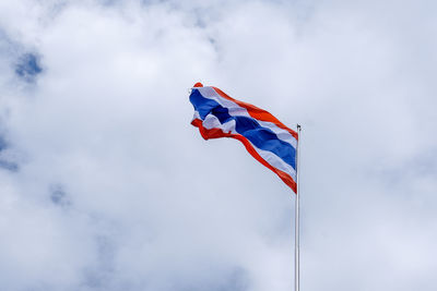 Low angle view of thailand flag against sky