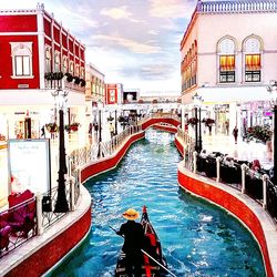 View of canal along buildings