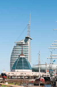 View of modern building against blue sky