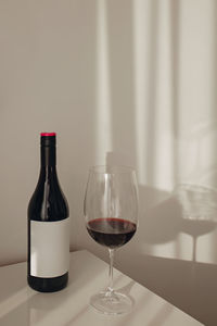 Close-up of wineglass on table