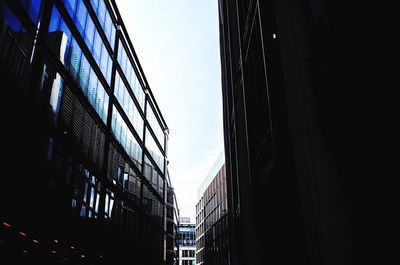 Low angle view of skyscrapers against sky