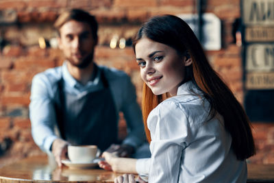 Portrait of woman with coffee