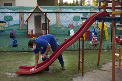 Girl playing on playground