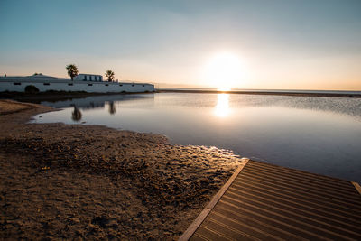 Scenic view of sea against sky during sunset