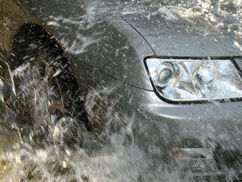 High angle view of wet car on rainy day