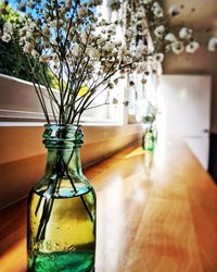 Close-up of flower vase on table