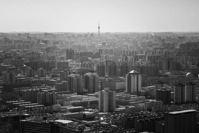 High angle view of modern buildings in city against sky