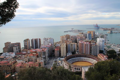 High angle shot of city against the sea