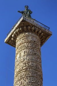 Close up on trajan's column in rome by day, italy