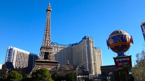 Low angle view of eiffel tower against clear sky