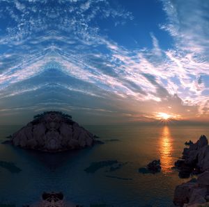 Scenic view of sea against sky during sunset