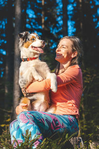 Portrait of woman with dog