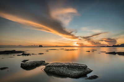 Scenic view of sea against sky during sunset