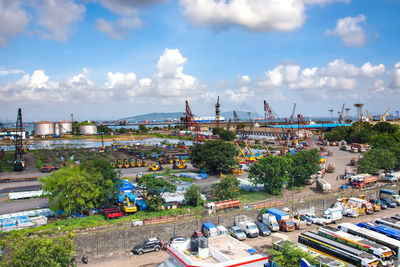 High angle view of buildings in city against sky