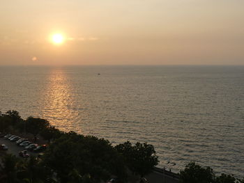 High angle view of sea against sky during sunset