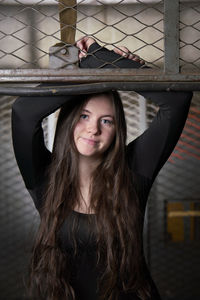 Portrait of smiling young woman looking away