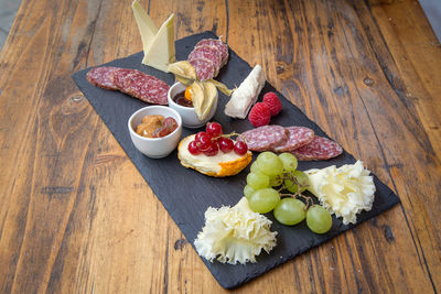 High angle view of various food on cutting board