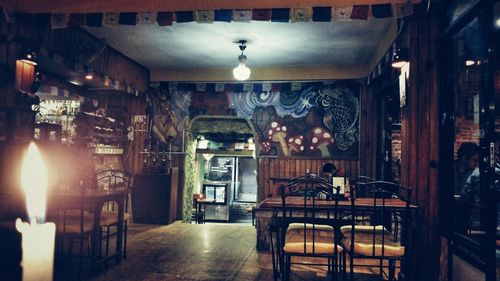 Empty chairs and tables in cafe