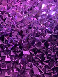 Full frame shot of purple patterned glass