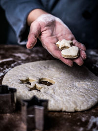 Chef preparing pastry on kitchen counter