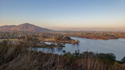 Scenic view of lake against sky during sunset