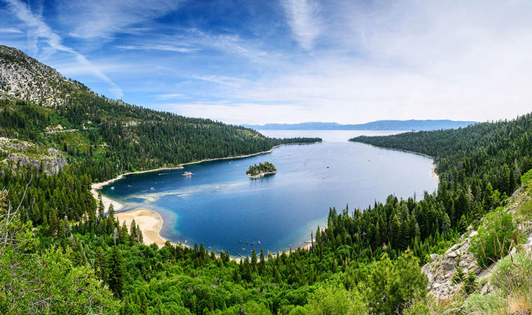 scenics, mountain, tree, water, nature, beauty in nature, sky, lake, tranquil scene, tranquility, landscape, high angle view, green color, blue, no people, forest, day, cloud - sky, outdoors, pine tree, mountain range, travel destinations