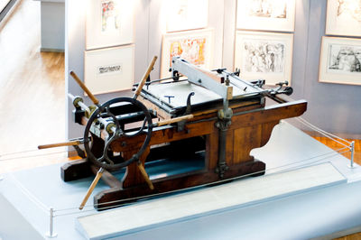 Close-up of old piano keys on table