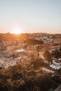 High angle view of townscape against sky during sunset