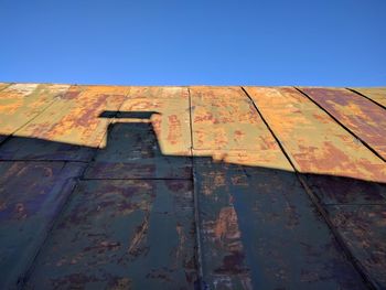 Text on blue wall