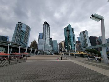 View of street and buildings against sky