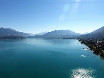 Scenic view of sea against clear blue sky