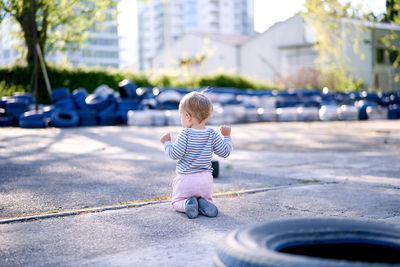 Rear view of girl on street 