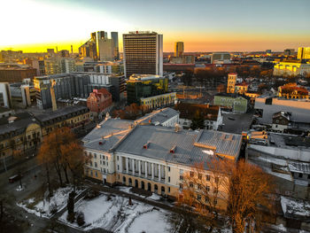 High angle view of buildings in city during winter