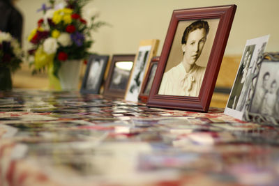 Close-up of picture frames on table