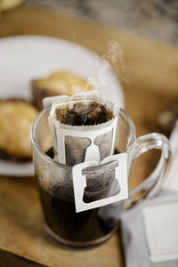 Close-up of coffee cup on table