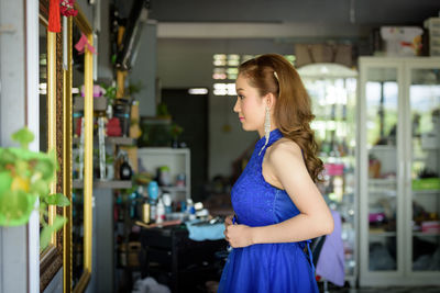 Woman standing in a store